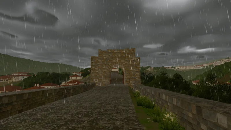 Rain on the bridge to the Main Gate, the cobbles dark and shining
