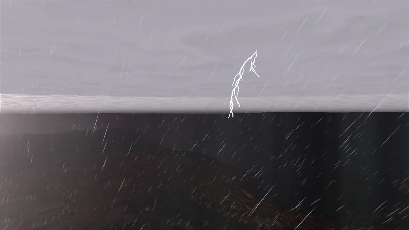 A thunderstorm, lightning forking down over the valley